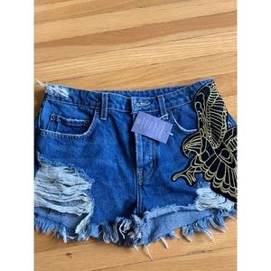 Carmar denim shorts with eagle design